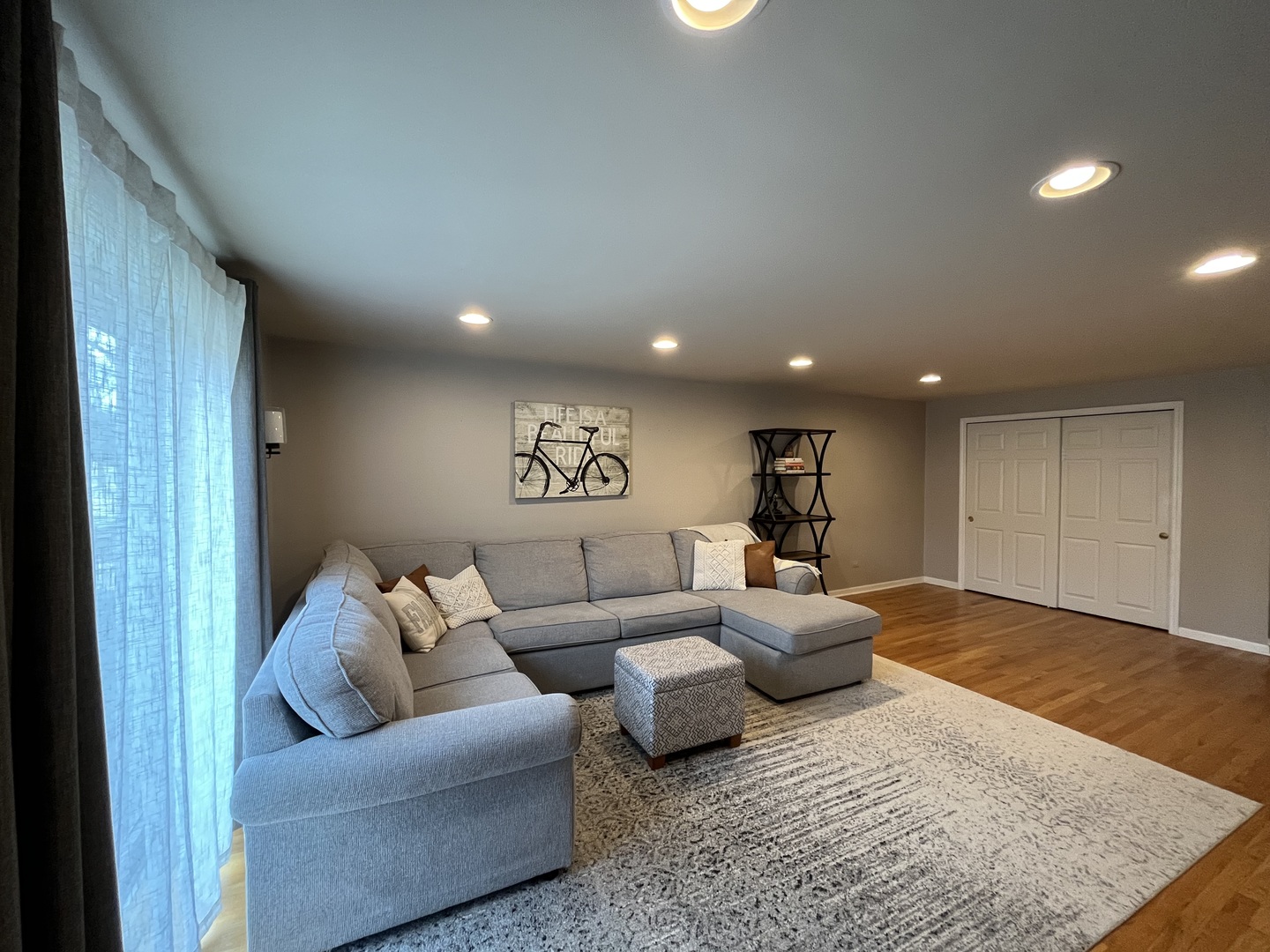 7621 Sawyer Road Darien, IL 60561 - Photo 16 of 28 a living room with furniture and a wooden floor