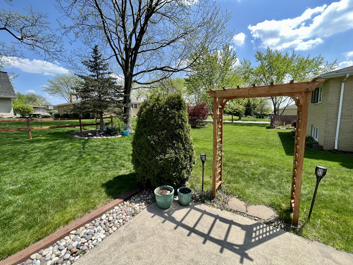 7621 Sawyer Road Darien, IL 60561 - Photo 7 of 28 a view of backyard with seating space and trees