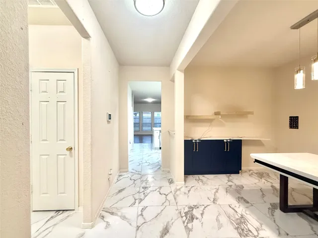 a spacious bathroom with a tub and shower