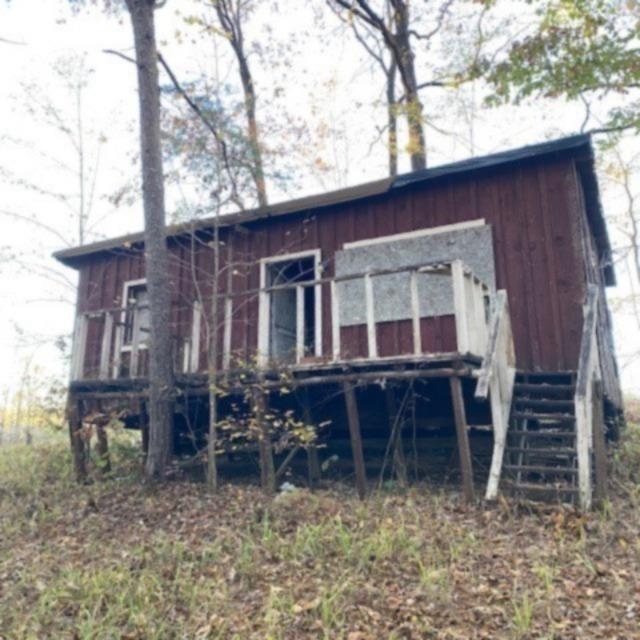 0 Cr 432 Road Ripley, MS 38663 - Photo 2 of 17 a house view with a seating space