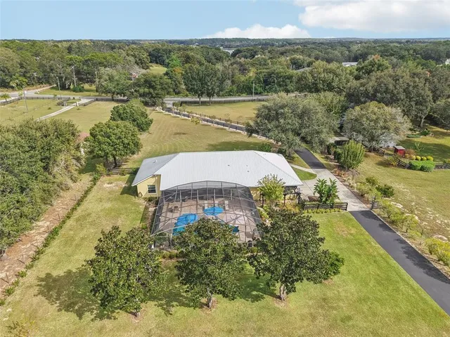 a view of a lake with a yard