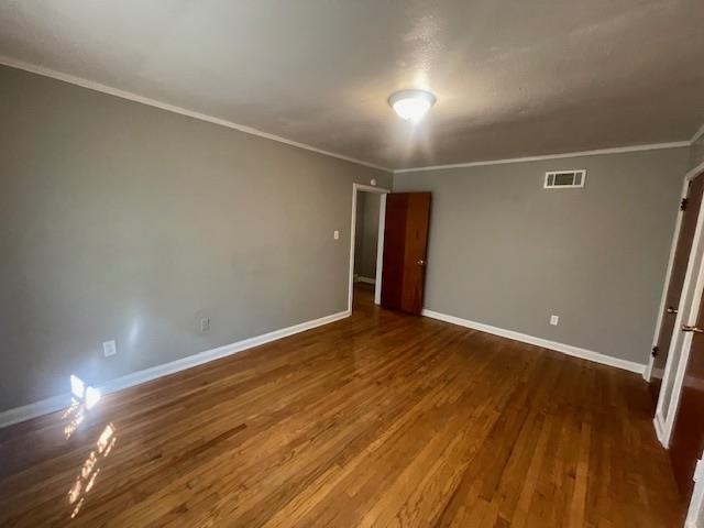 802 Waring Road Memphis, TN 38122 - Photo 8 of 12 a view of empty room with wooden floor
