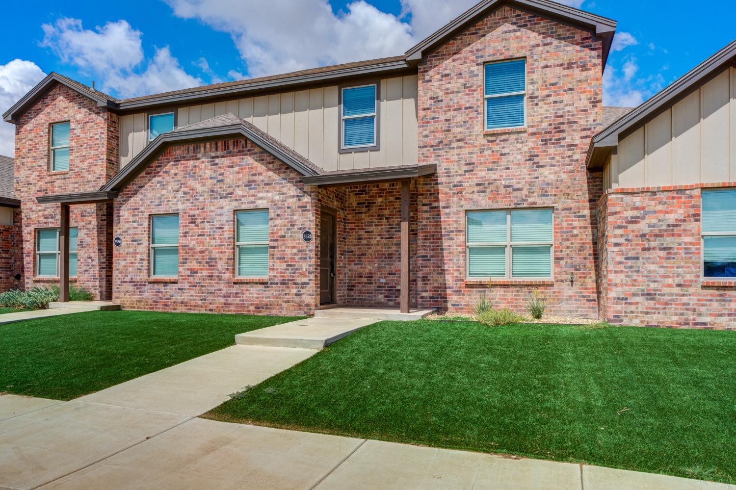 2528 137th Street Lubbock, TX 79423 - Photo 2 of 35 a front view of a house with a yard