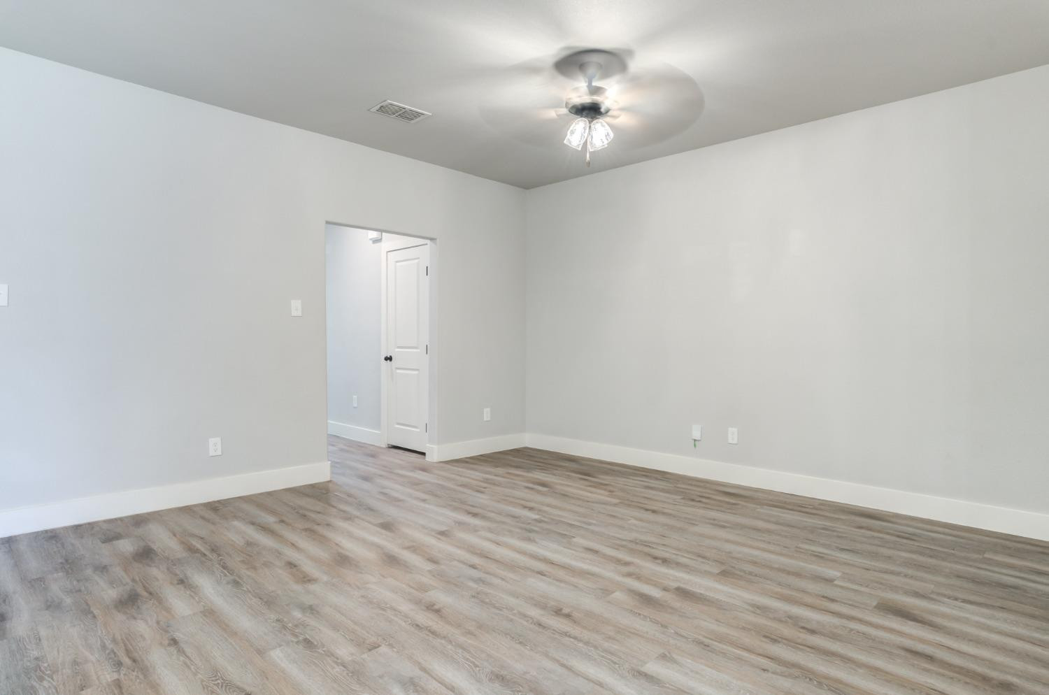 2528 137th Street Lubbock, TX 79423 - Photo 25 of 35 wooden floor in an empty room