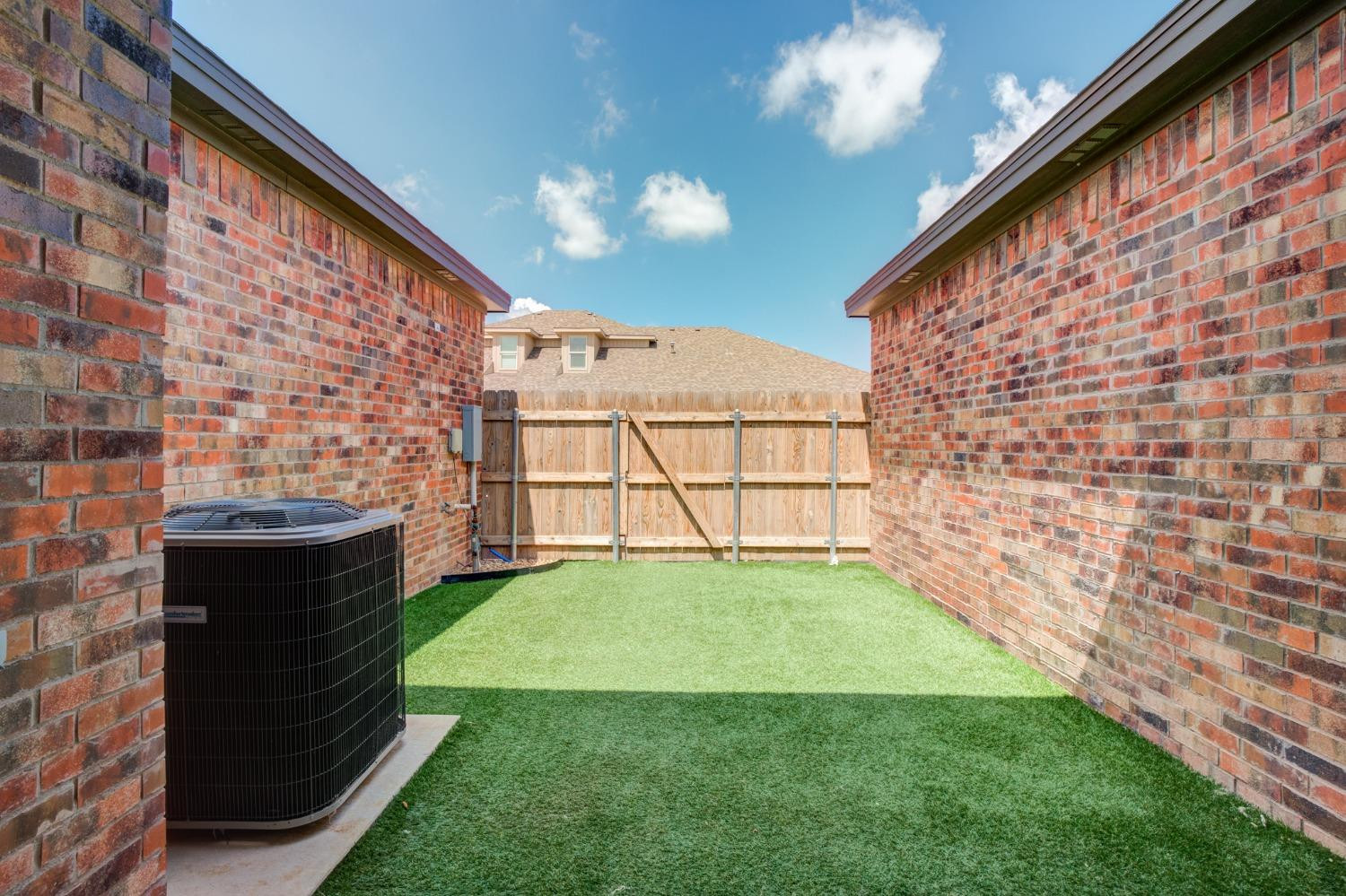 2528 137th Street Lubbock, TX 79423 - Photo 35 of 35 a view of a backyard with garden