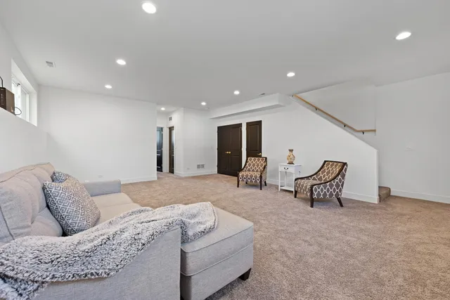 a living room with furniture and a couch