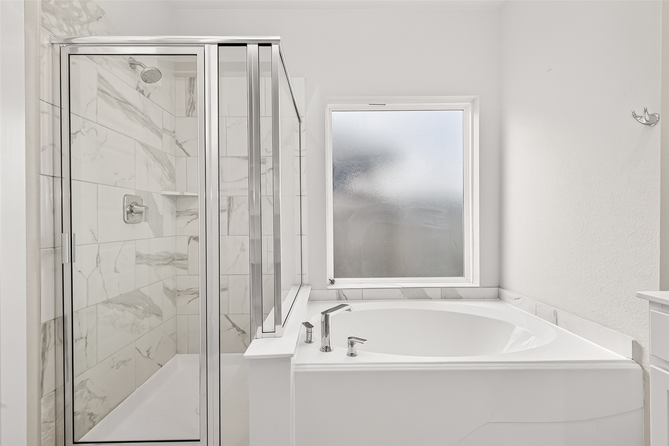 2142 Reed Cave Lane Spring, TX 77386 - Photo 30 of 50 a bathroom with a bathtub and a shower