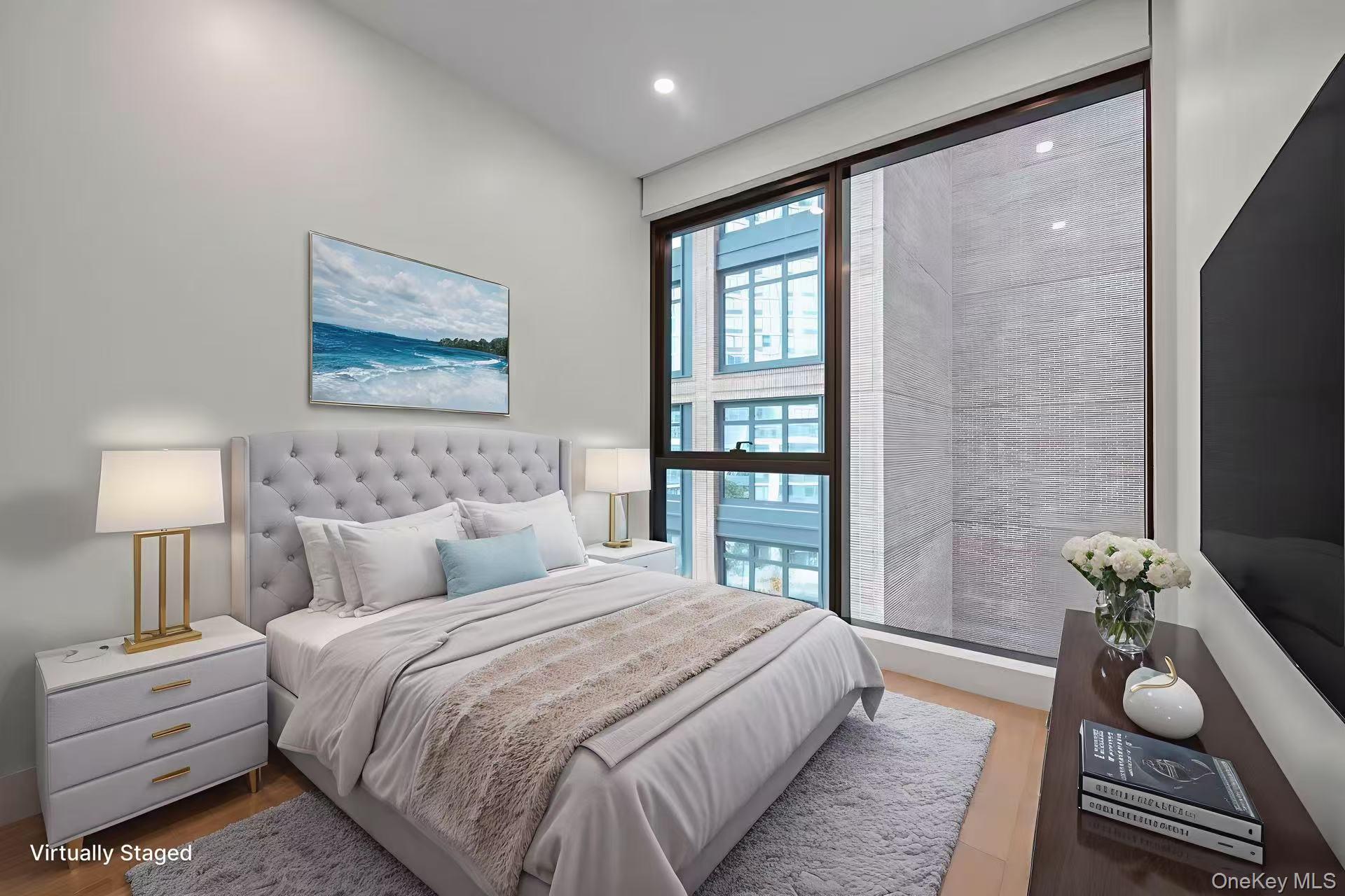 5 Ct Square West, Unit 6A Queens, NY 11101 - Photo 5 of 16 Bedroom featuring wood finished floors