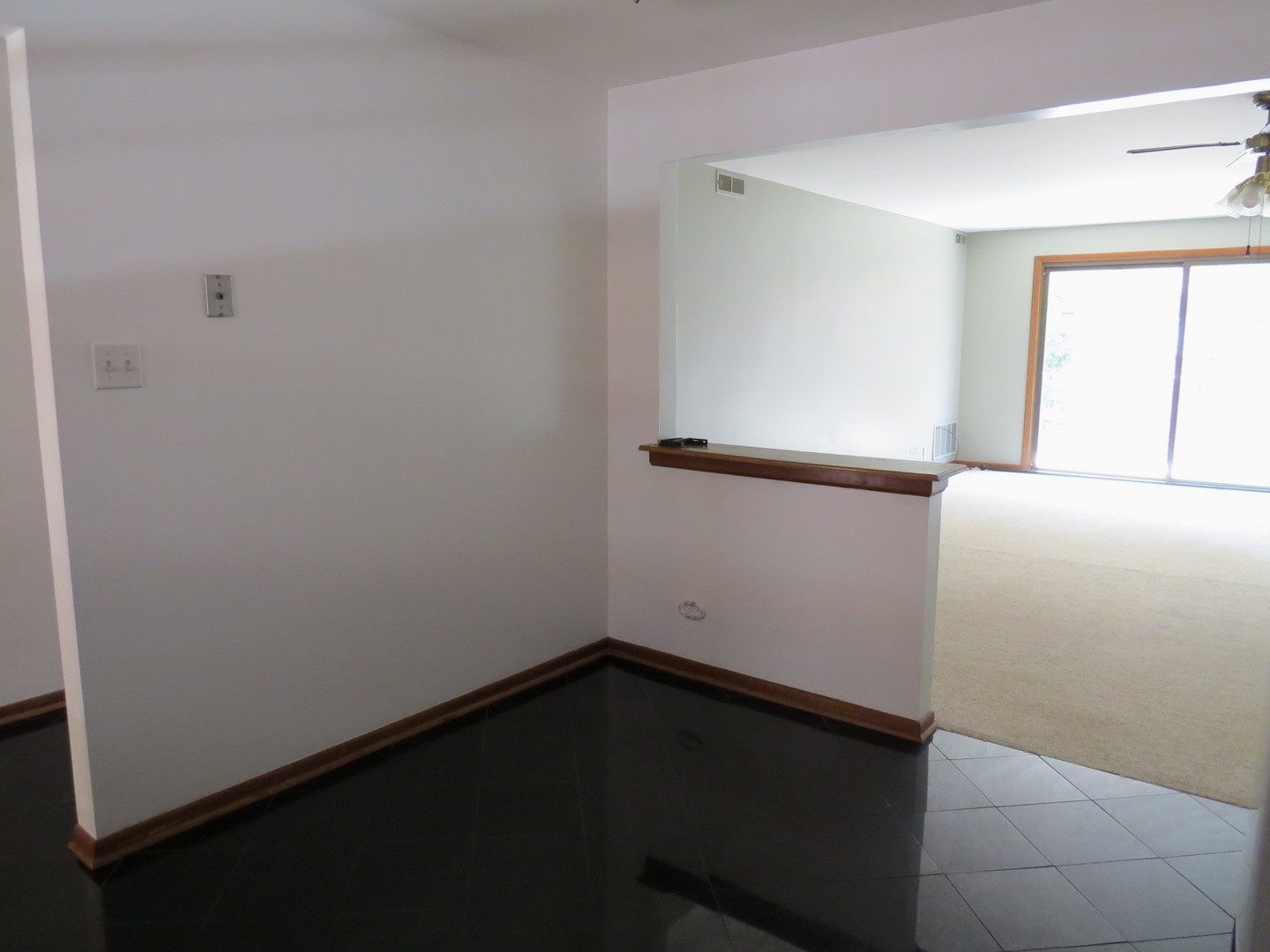 24 North Pistakee Lake Road, Unit 2D Fox Lake, IL 60020 - Photo 16 of 30 an empty room with a window