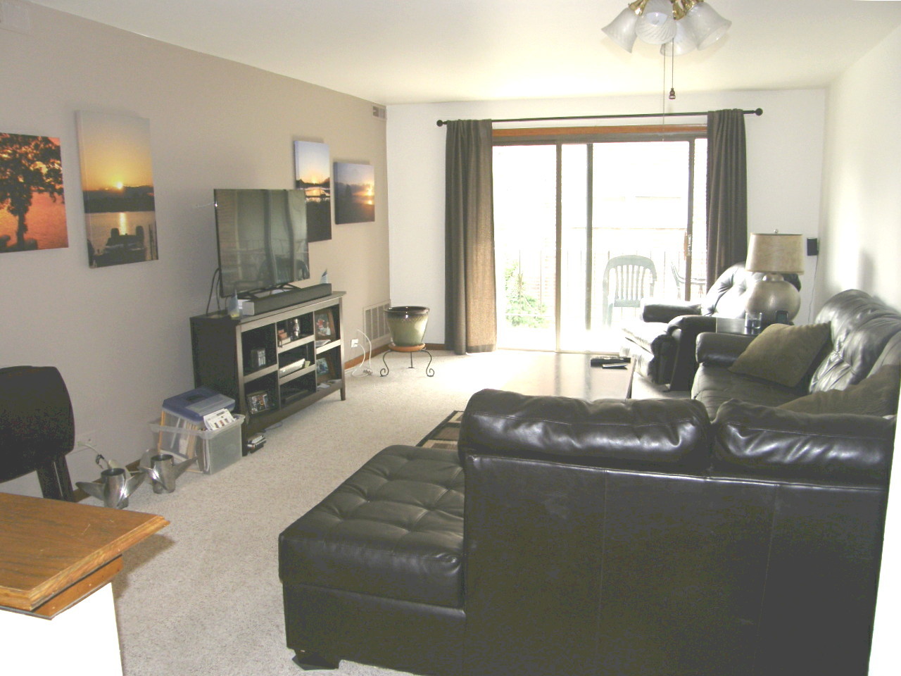 24 North Pistakee Lake Road, Unit 2D Fox Lake, IL 60020 - Photo 20 of 30 a living room with furniture and a window