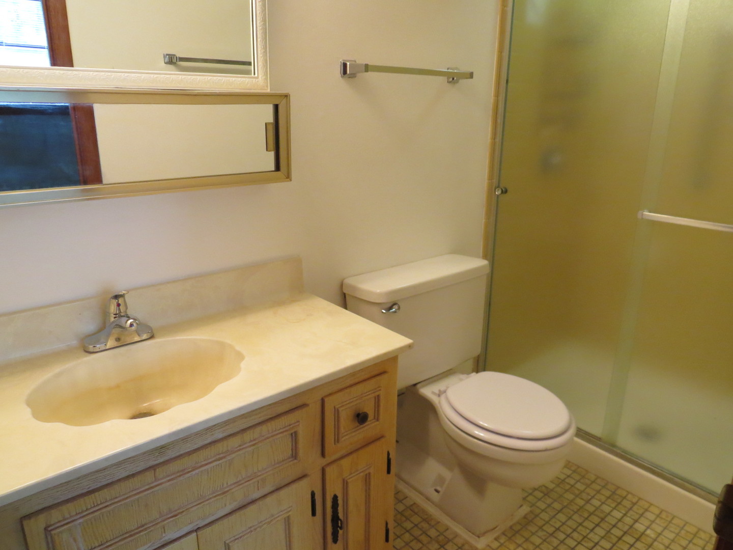 24 North Pistakee Lake Road, Unit 2D Fox Lake, IL 60020 - Photo 24 of 30 a bathroom with a sink a toilet and shower