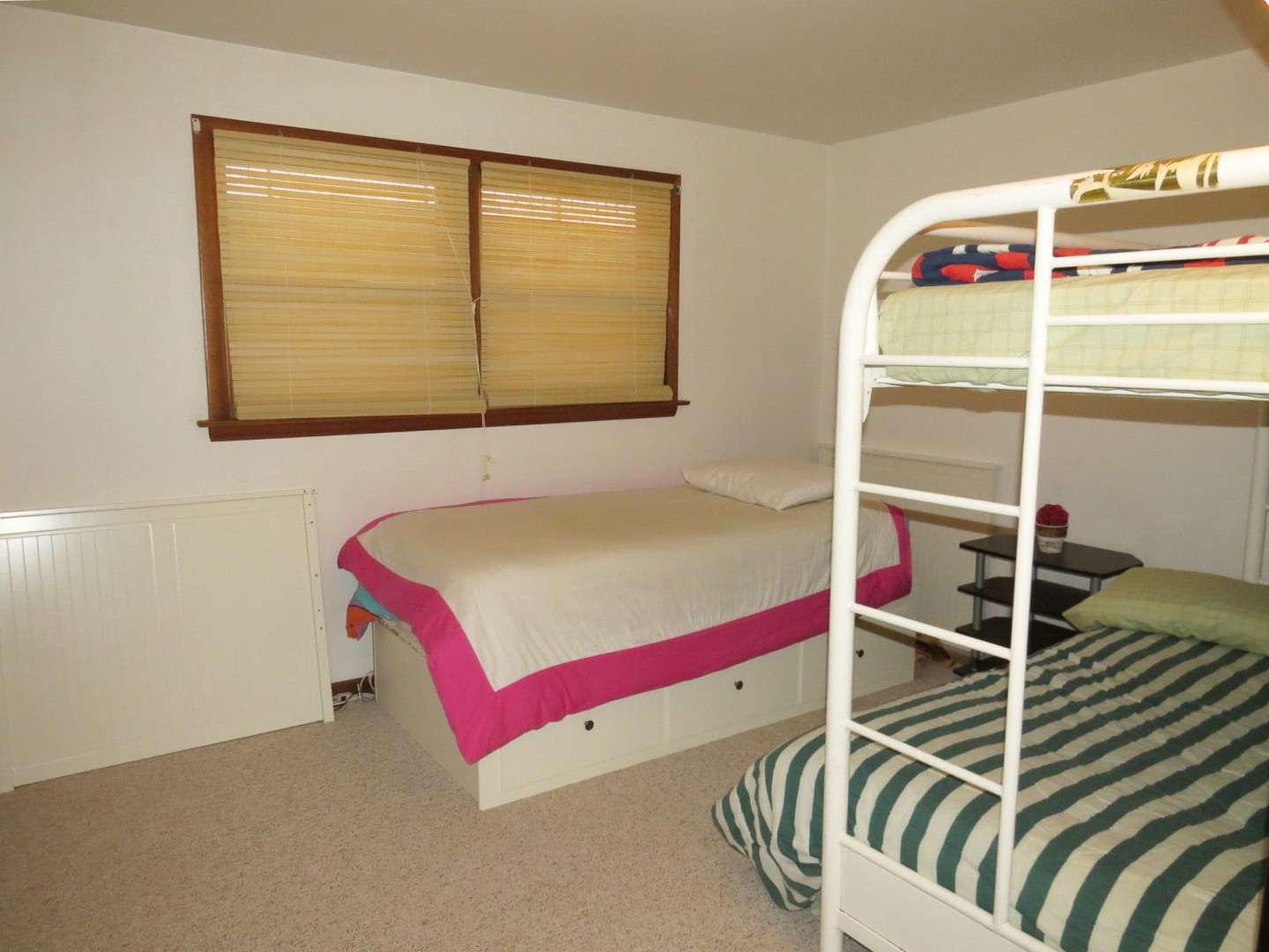 24 North Pistakee Lake Road, Unit 2D Fox Lake, IL 60020 - Photo 26 of 30 a bedroom with a bed and window