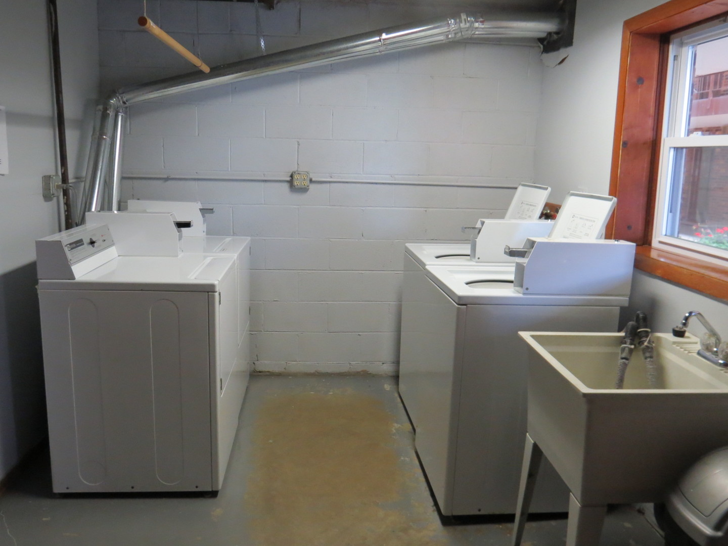 24 North Pistakee Lake Road, Unit 2D Fox Lake, IL 60020 - Photo 28 of 30 a bathroom with a sink and mirror