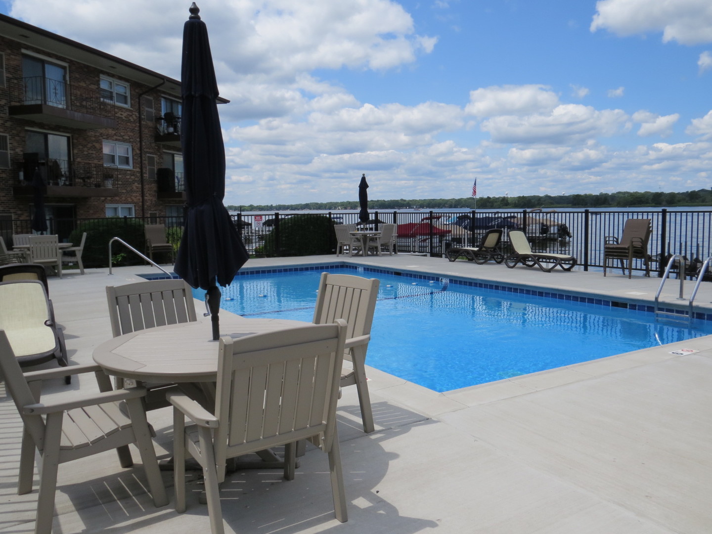 24 North Pistakee Lake Road, Unit 2D Fox Lake, IL 60020 - Photo 5 of 30 a view of a chairs and table in patio