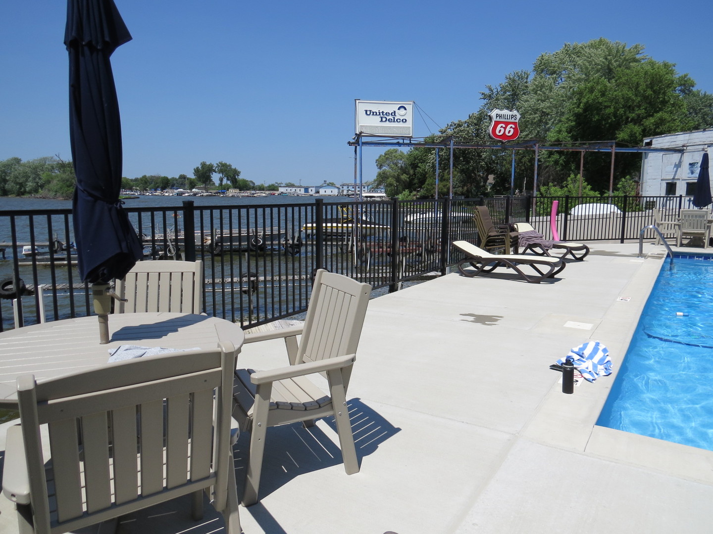 24 North Pistakee Lake Road, Unit 2D Fox Lake, IL 60020 - Photo 8 of 30 a view of a balcony dining table and chairs