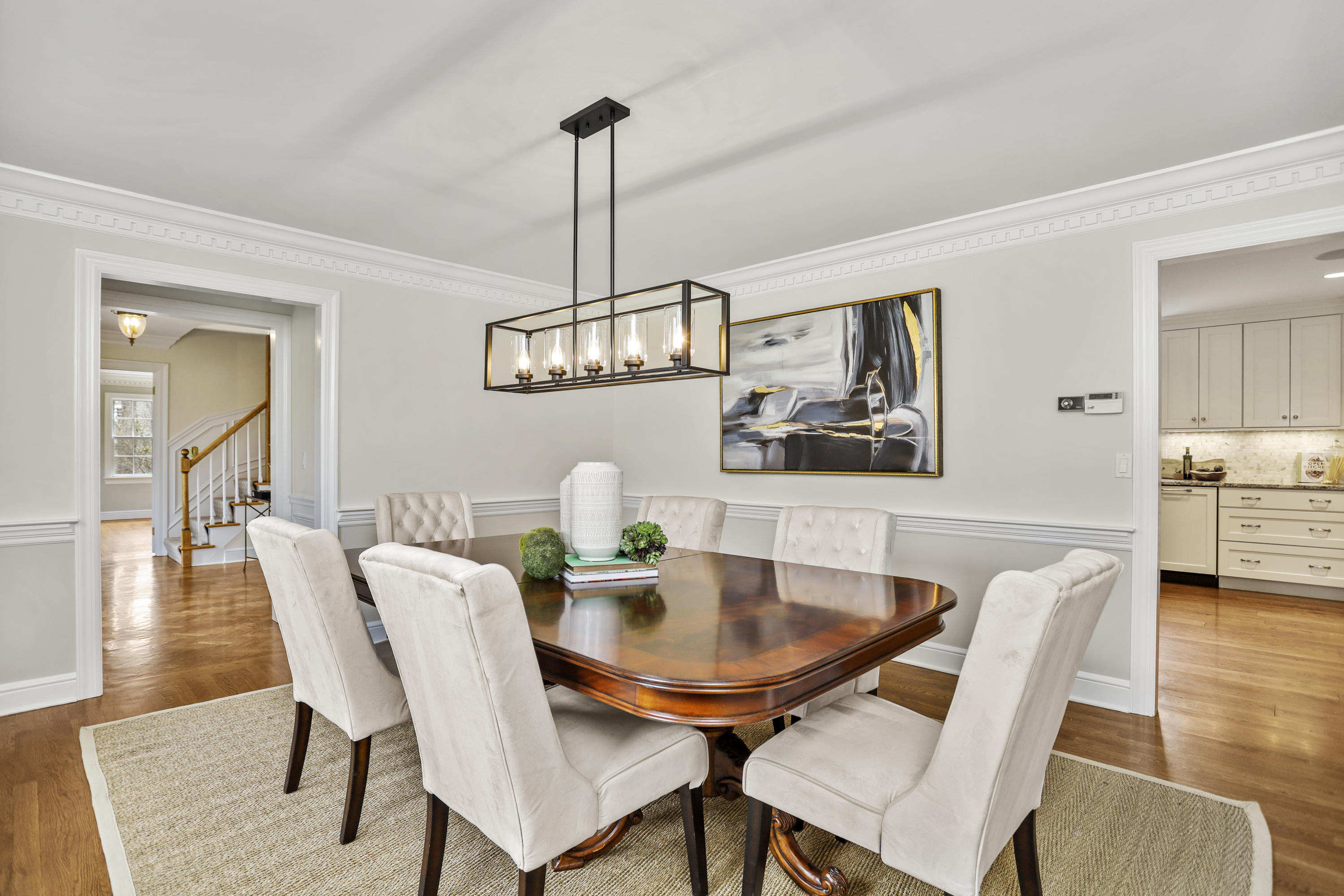 501 Brookside Road New Canaan, CT 06840 - Photo 14 of 38 a view of a dining room with furniture wooden floor and chandelier
