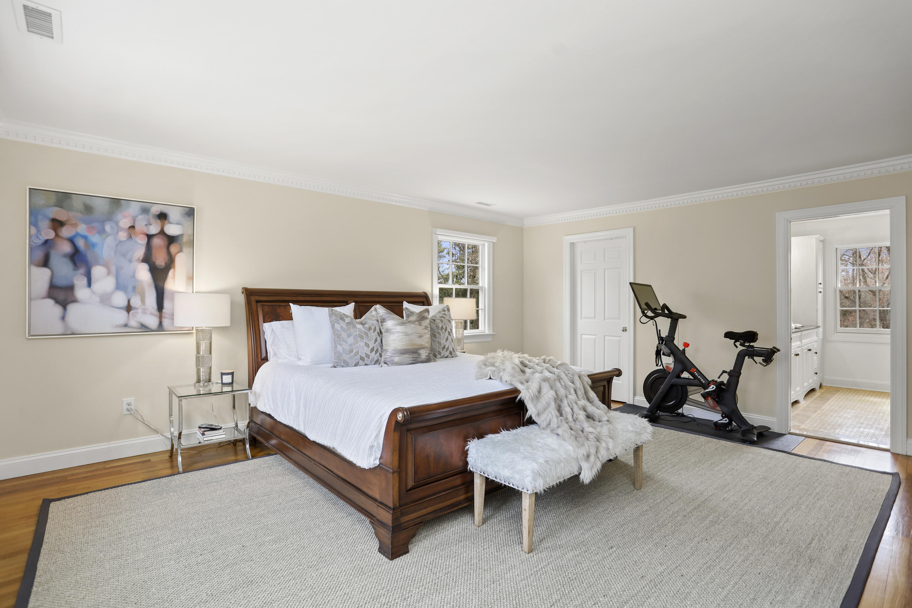 501 Brookside Road New Canaan, CT 06840 - Photo 16 of 38 a spacious bedroom with a bed and a couch