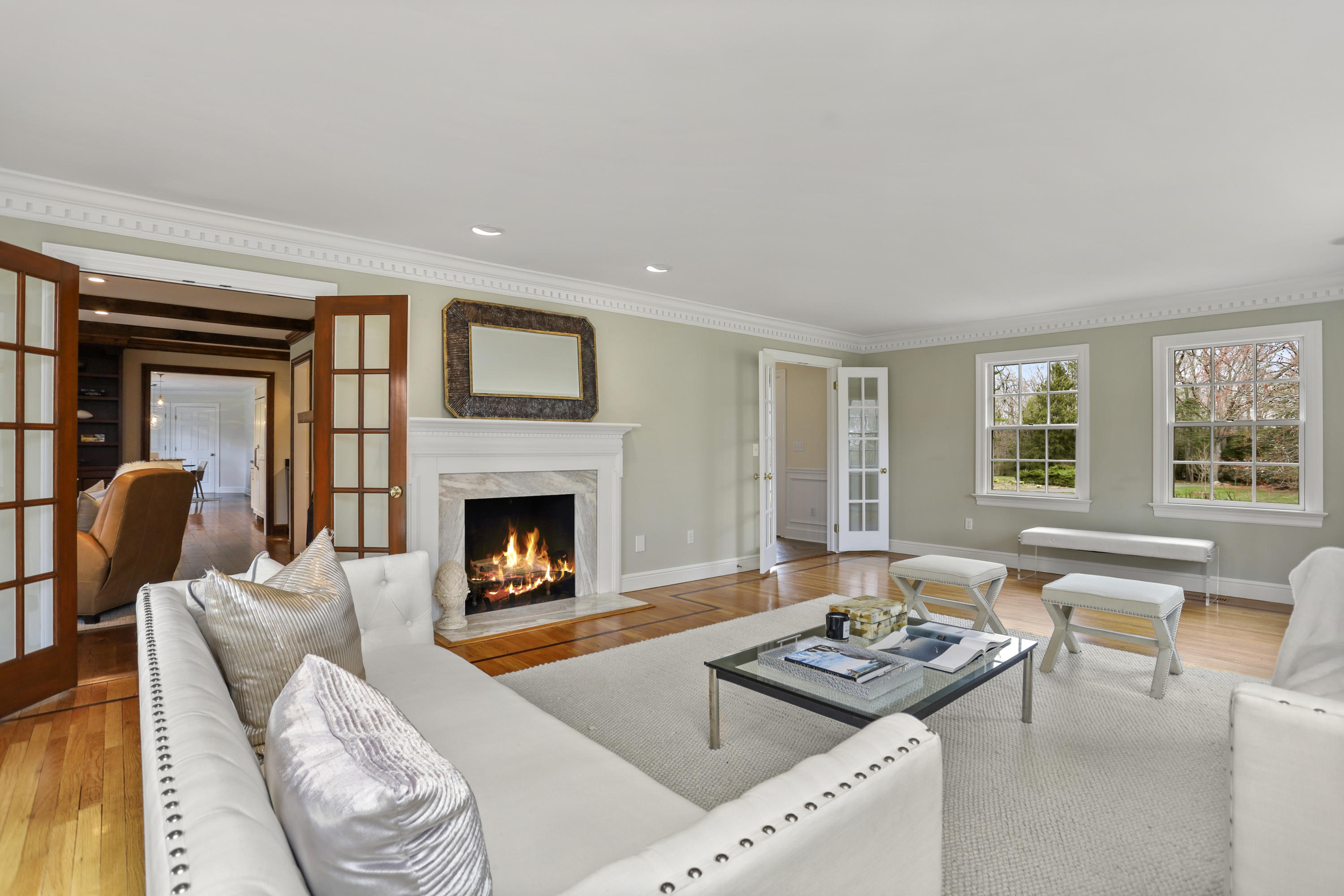 501 Brookside Road New Canaan, CT 06840 - Photo 3 of 38 a living room with furniture and a fireplace