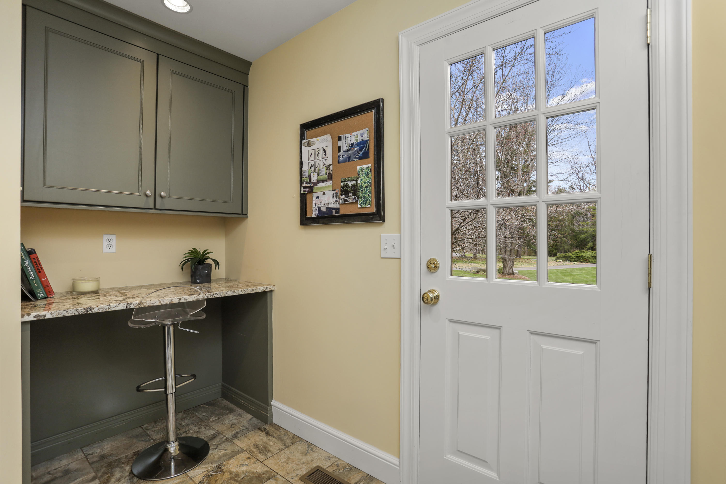 501 Brookside Road New Canaan, CT 06840 - Photo 8 of 38 a room with a window and cabinets