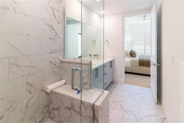 a en suite bathroom with a sink and tub