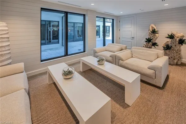 a living room with furniture and window