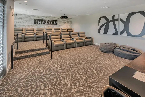 a room with furniture and a flat screen tv