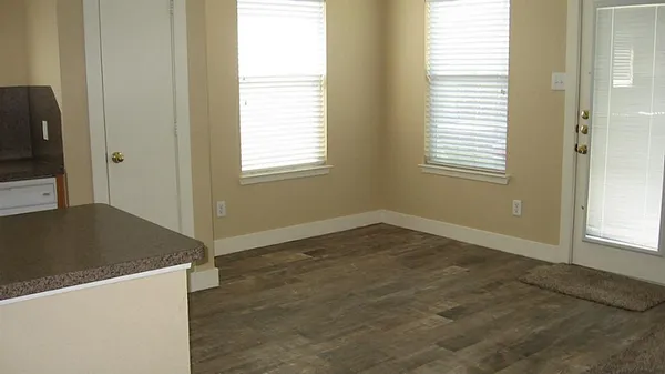 a view of an empty room and window