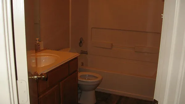 a bathroom with a sink and toilet
