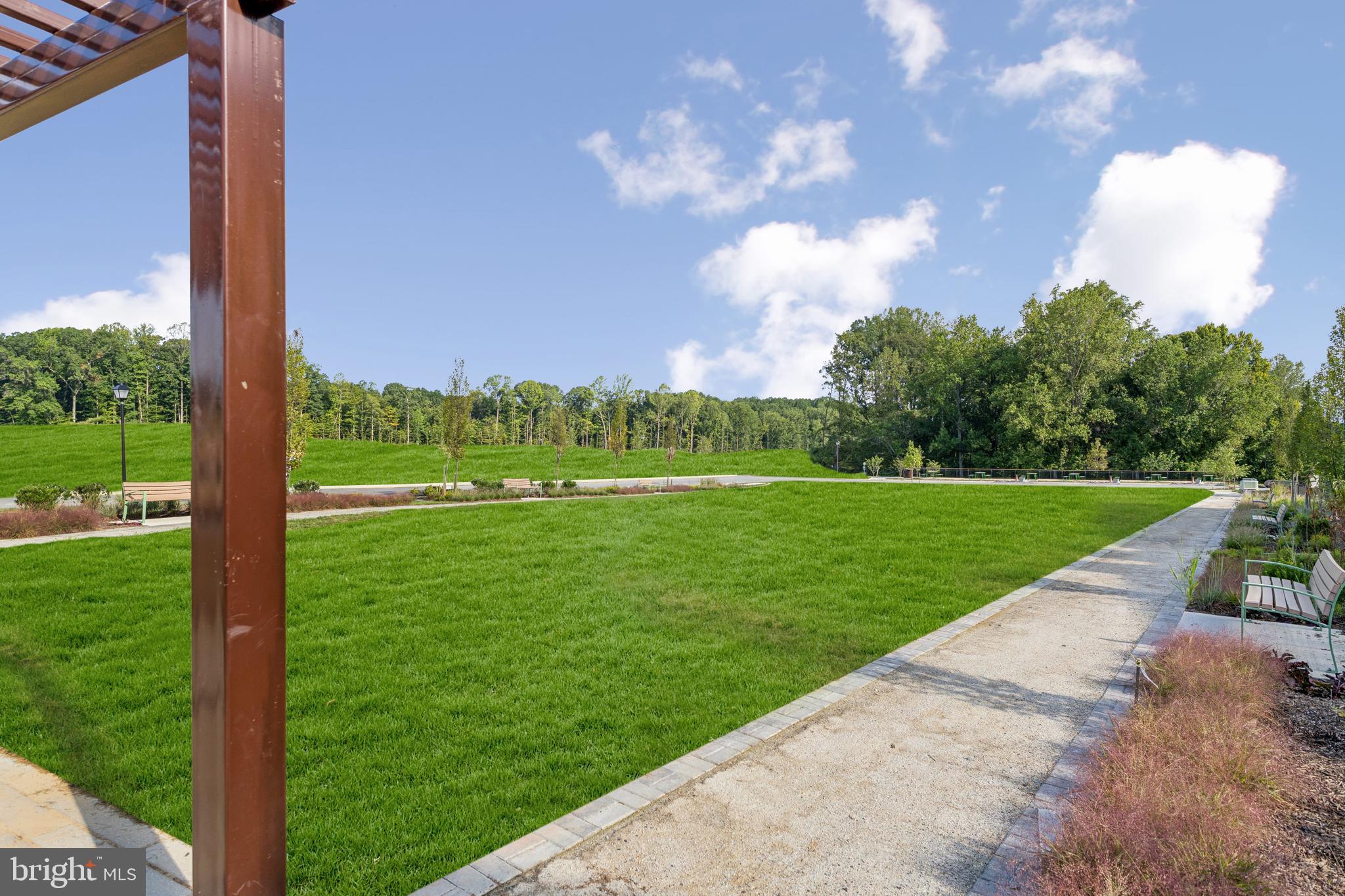 10980 Pinnacle Green Road Upper Marlboro, MD 20774 - Photo 27 of 30 a view of a field with a tree in a yard