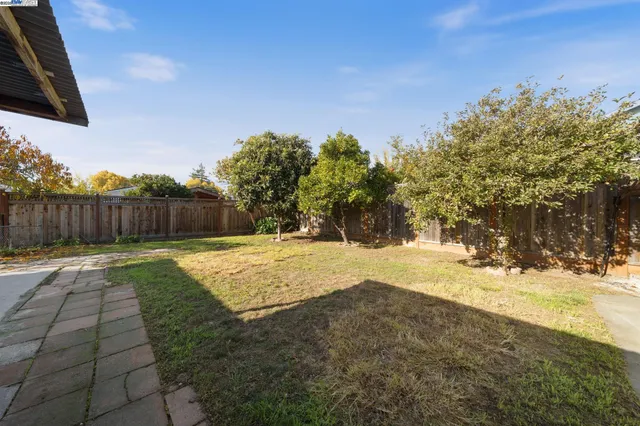 a view of a storage room with wooden floor