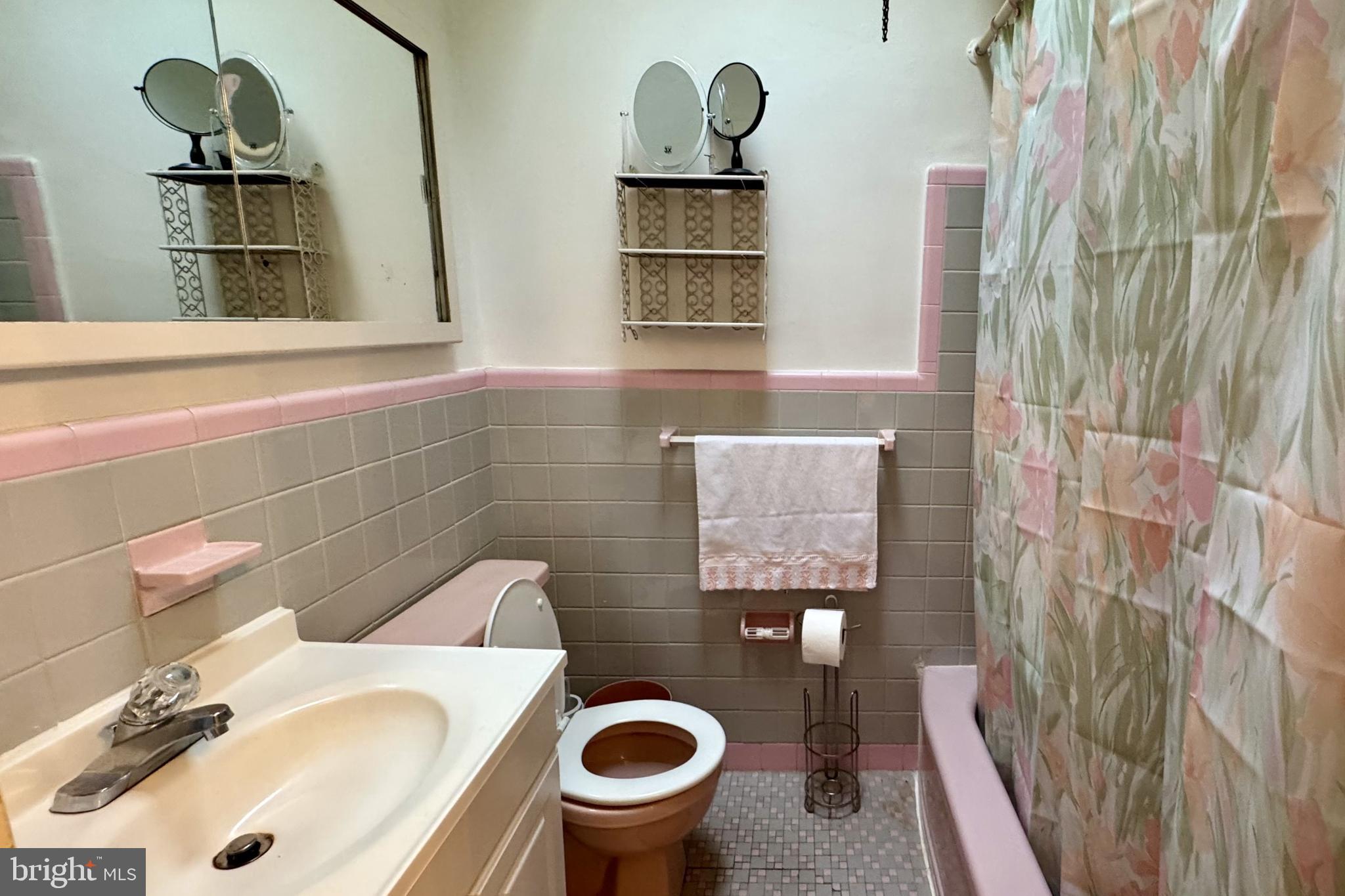 2317 Emerson Street Philadelphia, PA 19152 - Photo 11 of 18 a bathroom with a sink and a toilet