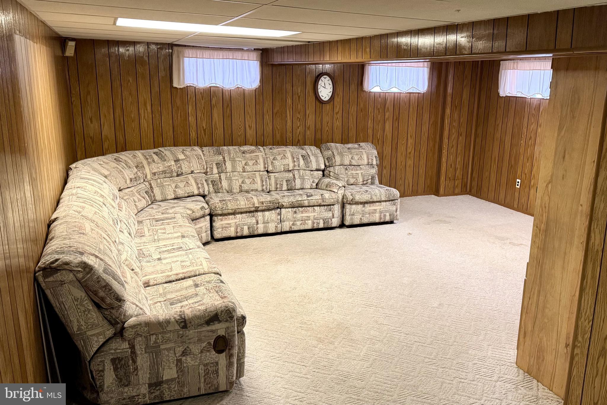 2317 Emerson Street Philadelphia, PA 19152 - Photo 13 of 18 a bedroom with a bed and a mirror