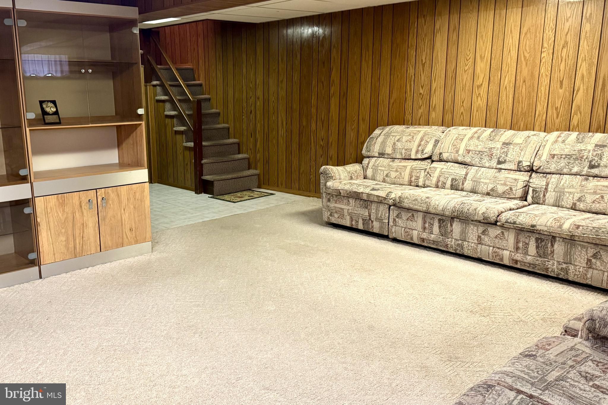 2317 Emerson Street Philadelphia, PA 19152 - Photo 14 of 18 a living room with a bed and furniture