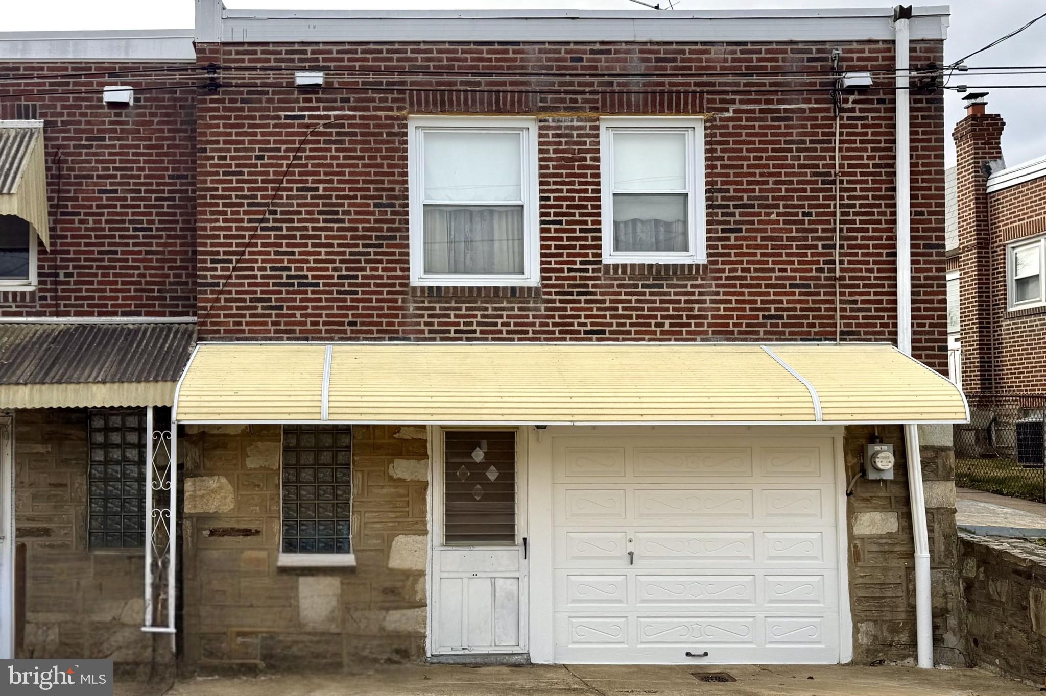 2317 Emerson Street Philadelphia, PA 19152 - Photo 16 of 18 a front view of a house with glass windows