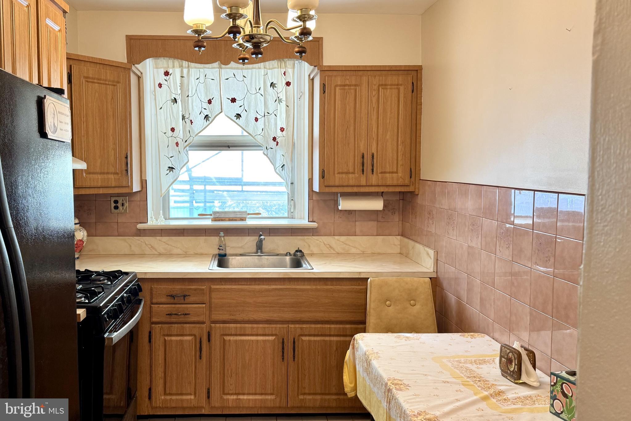 2317 Emerson Street Philadelphia, PA 19152 - Photo 3 of 18 a bathroom with a sink vanity toilet and tub