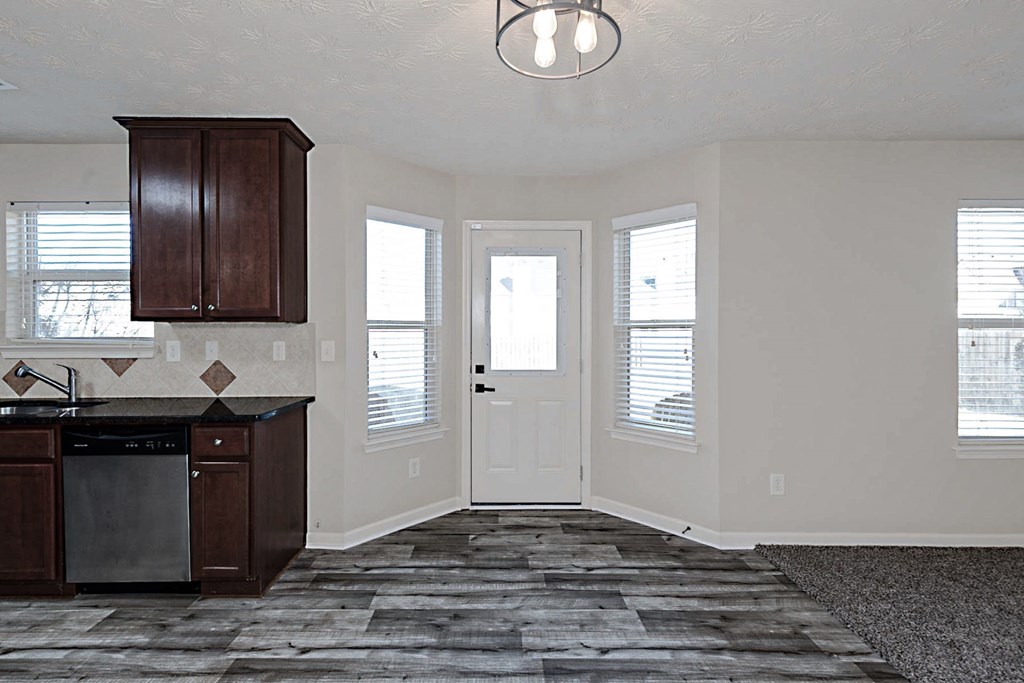 18 Memorial Drive Fort Mitchell, AL 36856 - Photo 11 of 33 a view of a kitchen sink and wooden floor