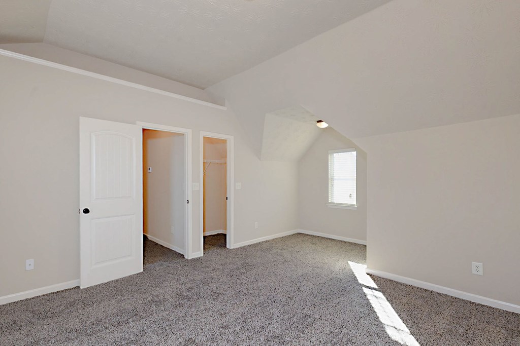 18 Memorial Drive Fort Mitchell, AL 36856 - Photo 13 of 33 an empty room with windows and closet