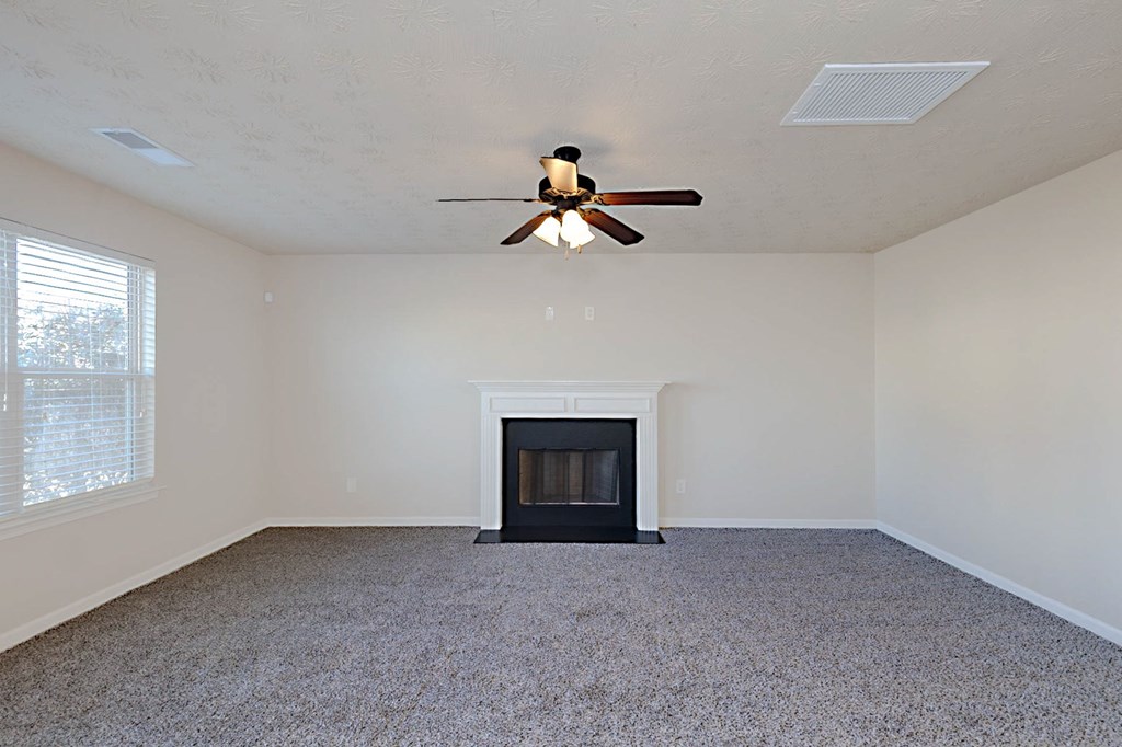 18 Memorial Drive Fort Mitchell, AL 36856 - Photo 29 of 33 a living room with a fireplace
