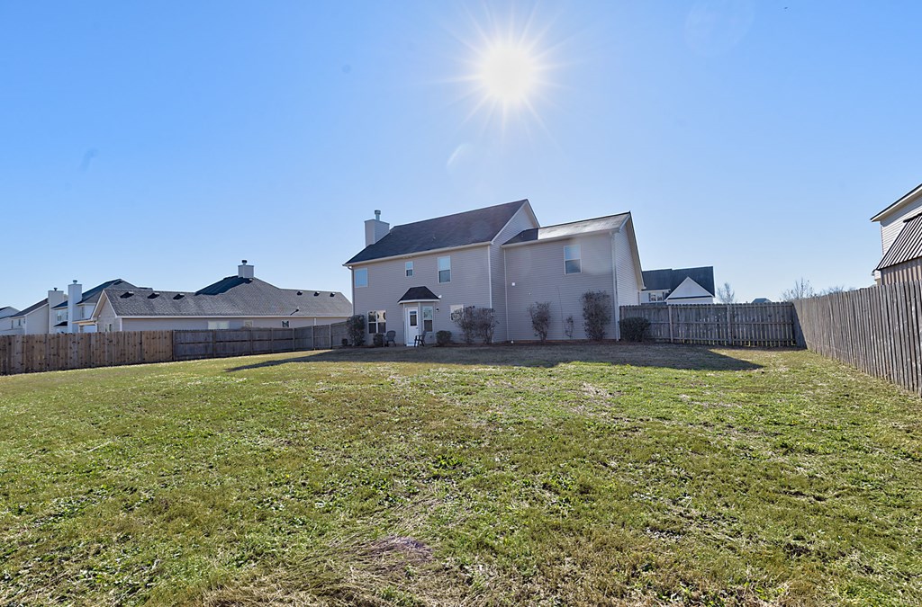 18 Memorial Drive Fort Mitchell, AL 36856 - Photo 30 of 33 a house view with a garden space
