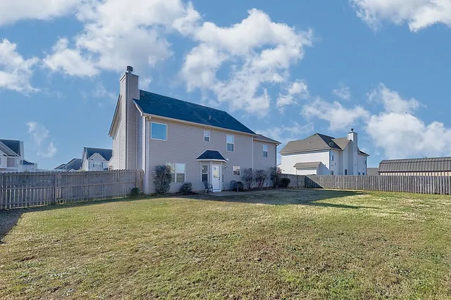 a house view with a garden space