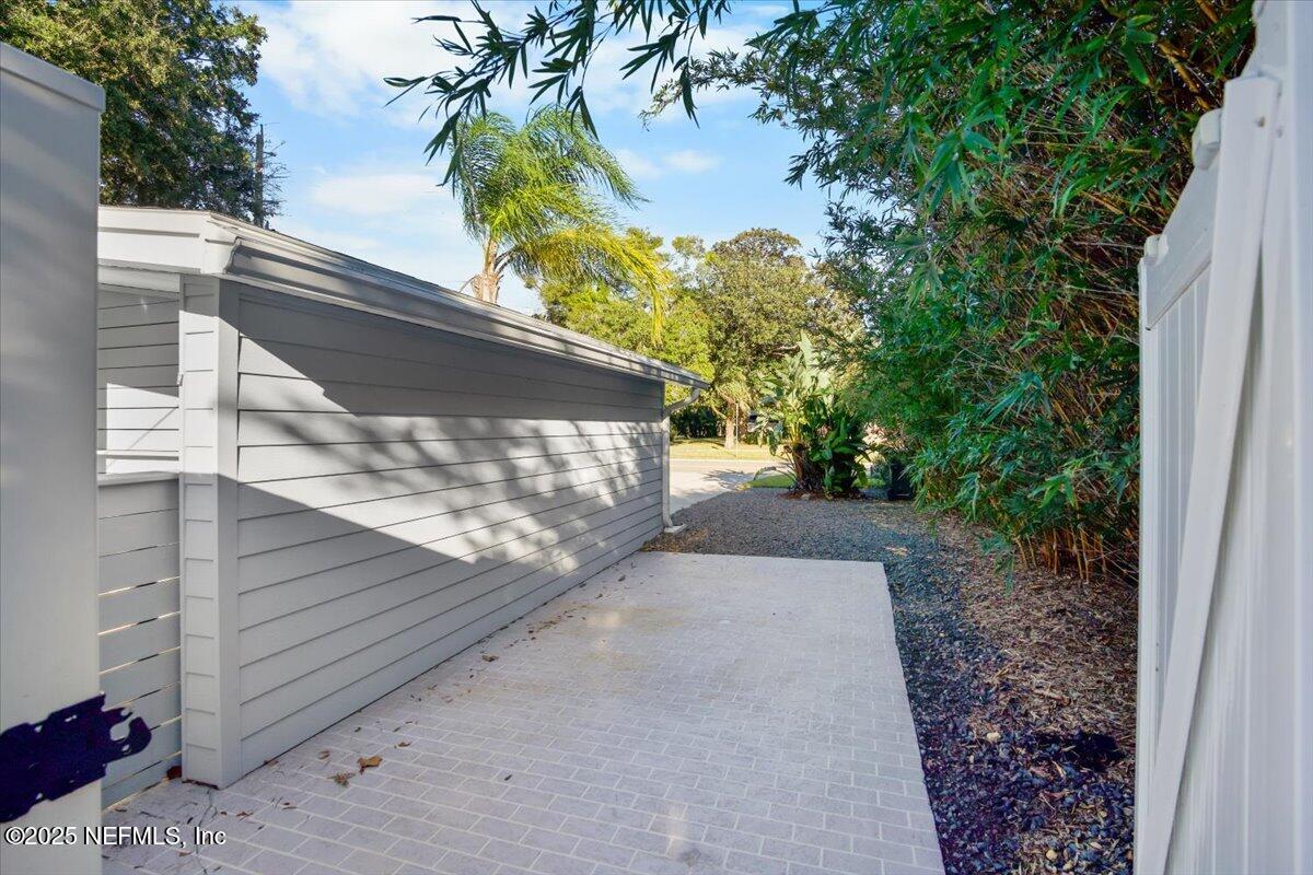 318 Royal Palms Drive Atlantic Beach, FL 32233 - Photo 18 of 39 SIDE YARD NEXT TO CAR PORT