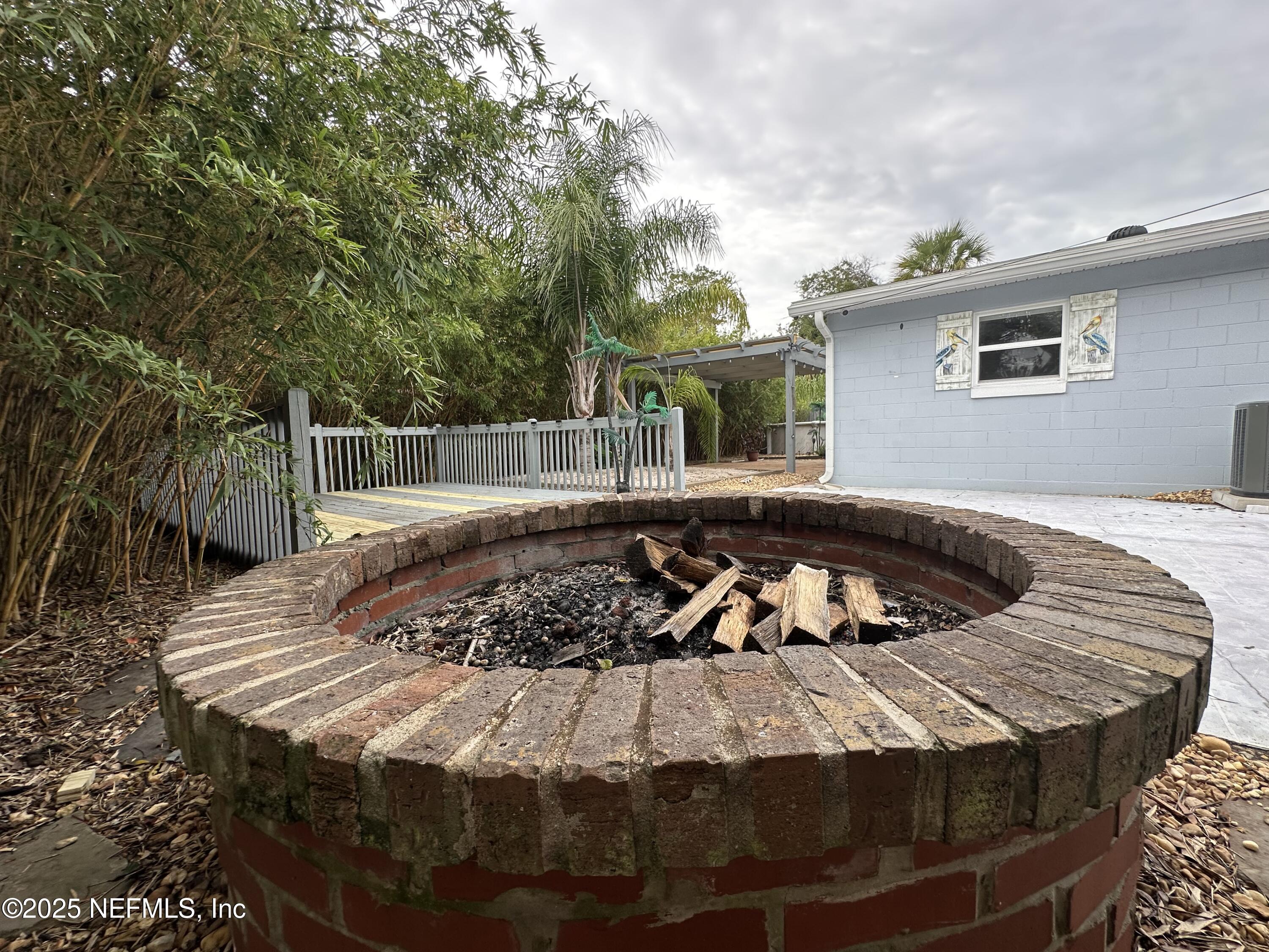 318 Royal Palms Drive Atlantic Beach, FL 32233 - Photo 22 of 39 FIRE PIT IN BACK YARD