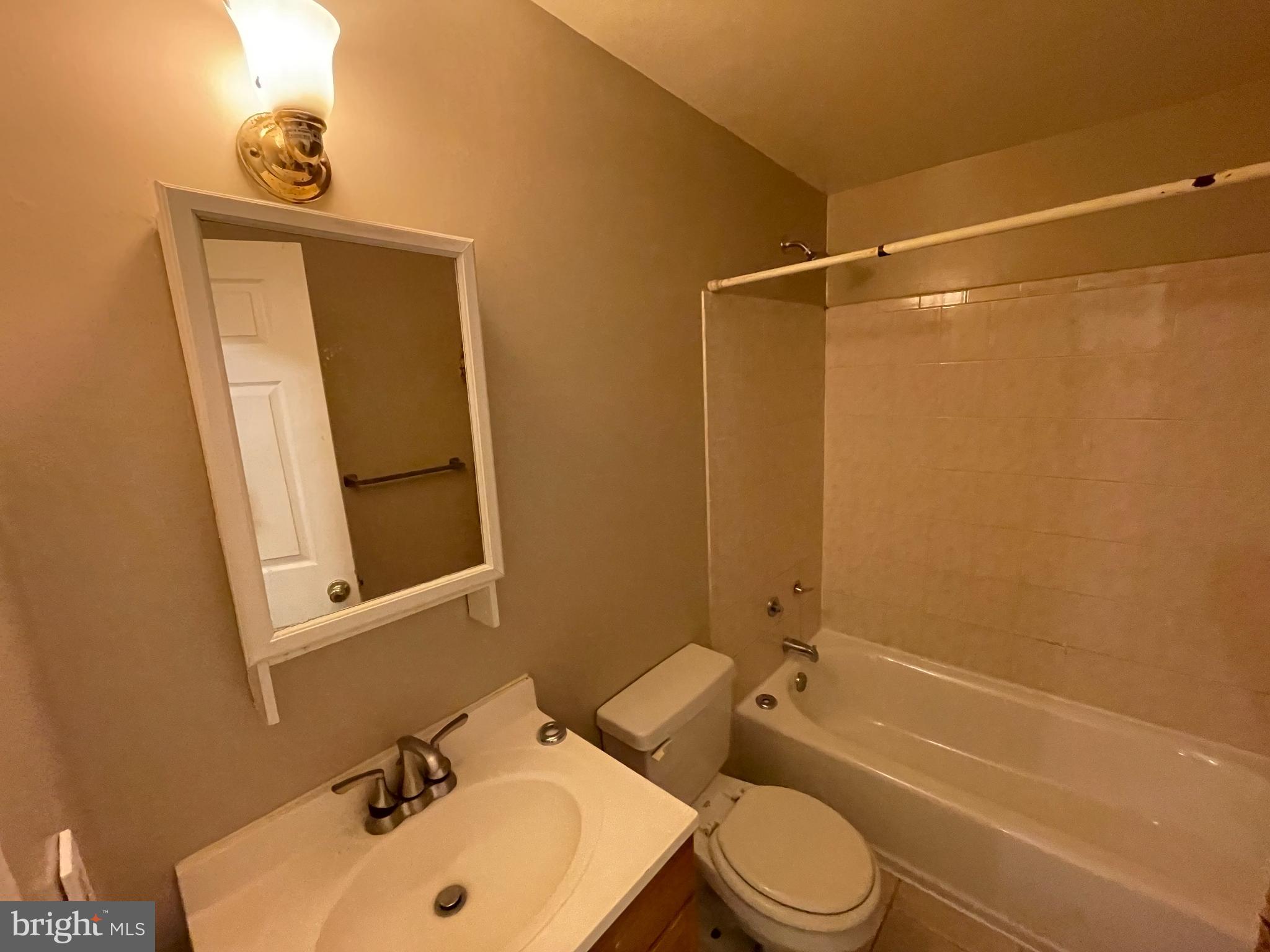 1339 U Street Southeast Washington, DC 20020 - Photo 16 of 23 a bathroom with a sink toilet and shower