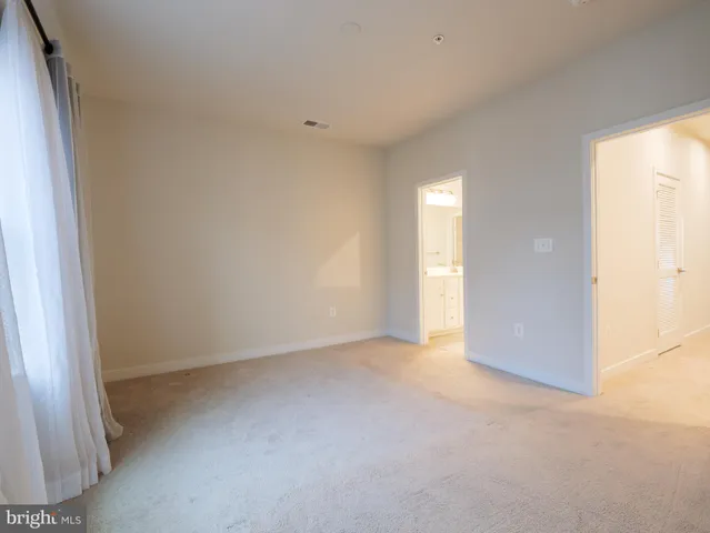 an empty room with an entryway