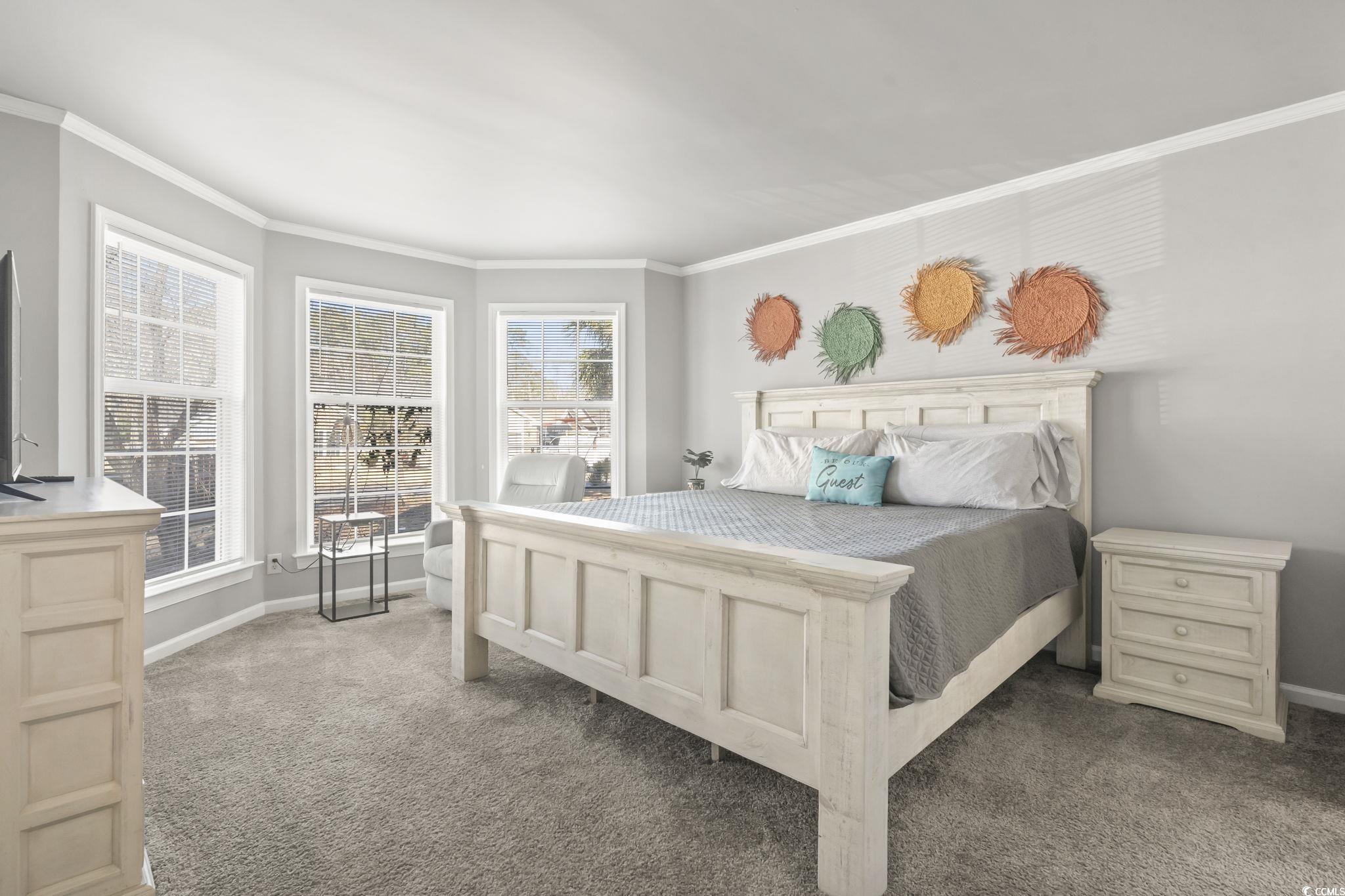 409 Knoll Court Myrtle Beach, SC 29588 - Photo 17 of 33 Carpeted bedroom featuring crown molding