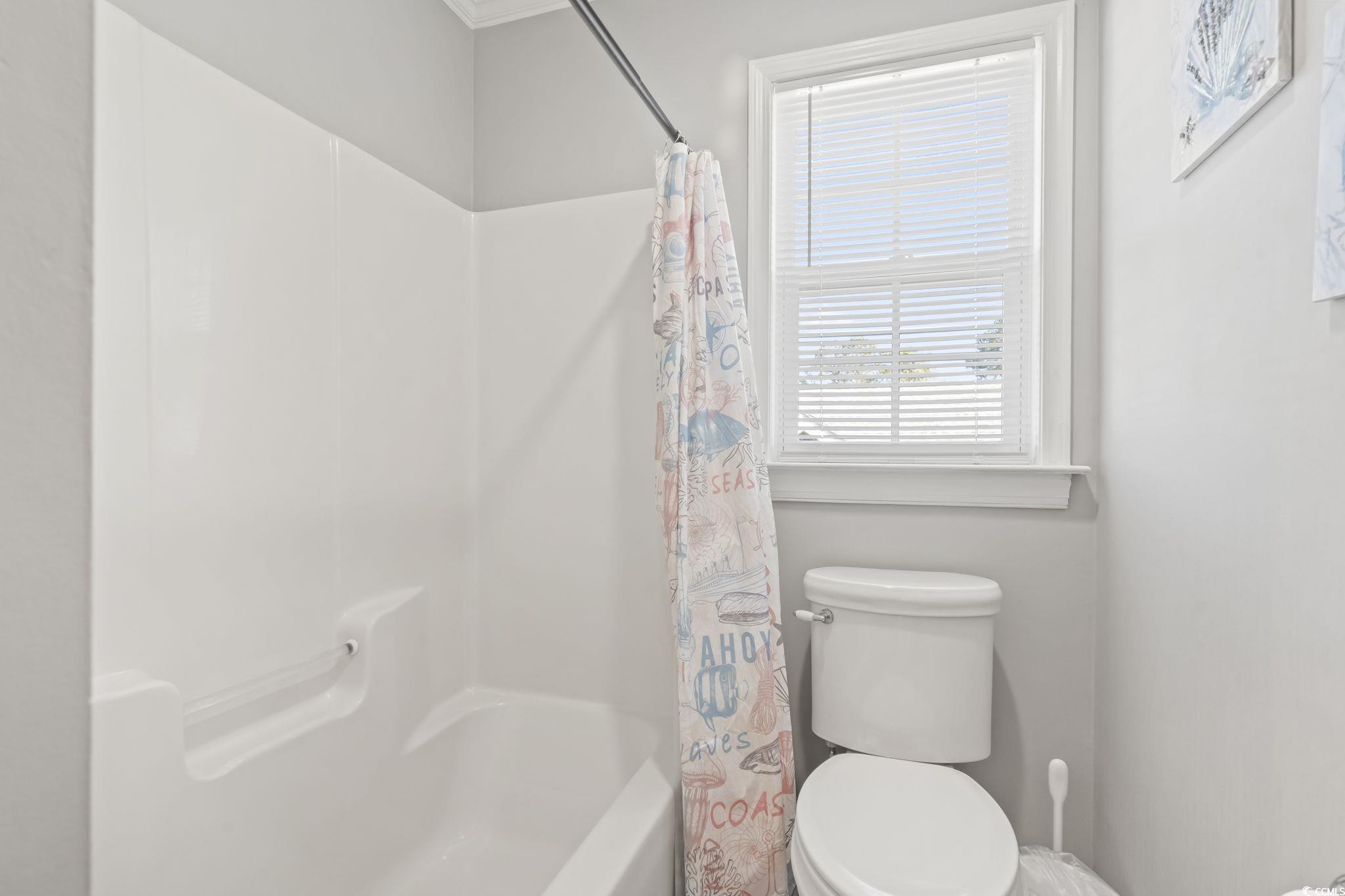 409 Knoll Court Myrtle Beach, SC 29588 - Photo 23 of 33 Bathroom featuring shower / bath combo and toilet