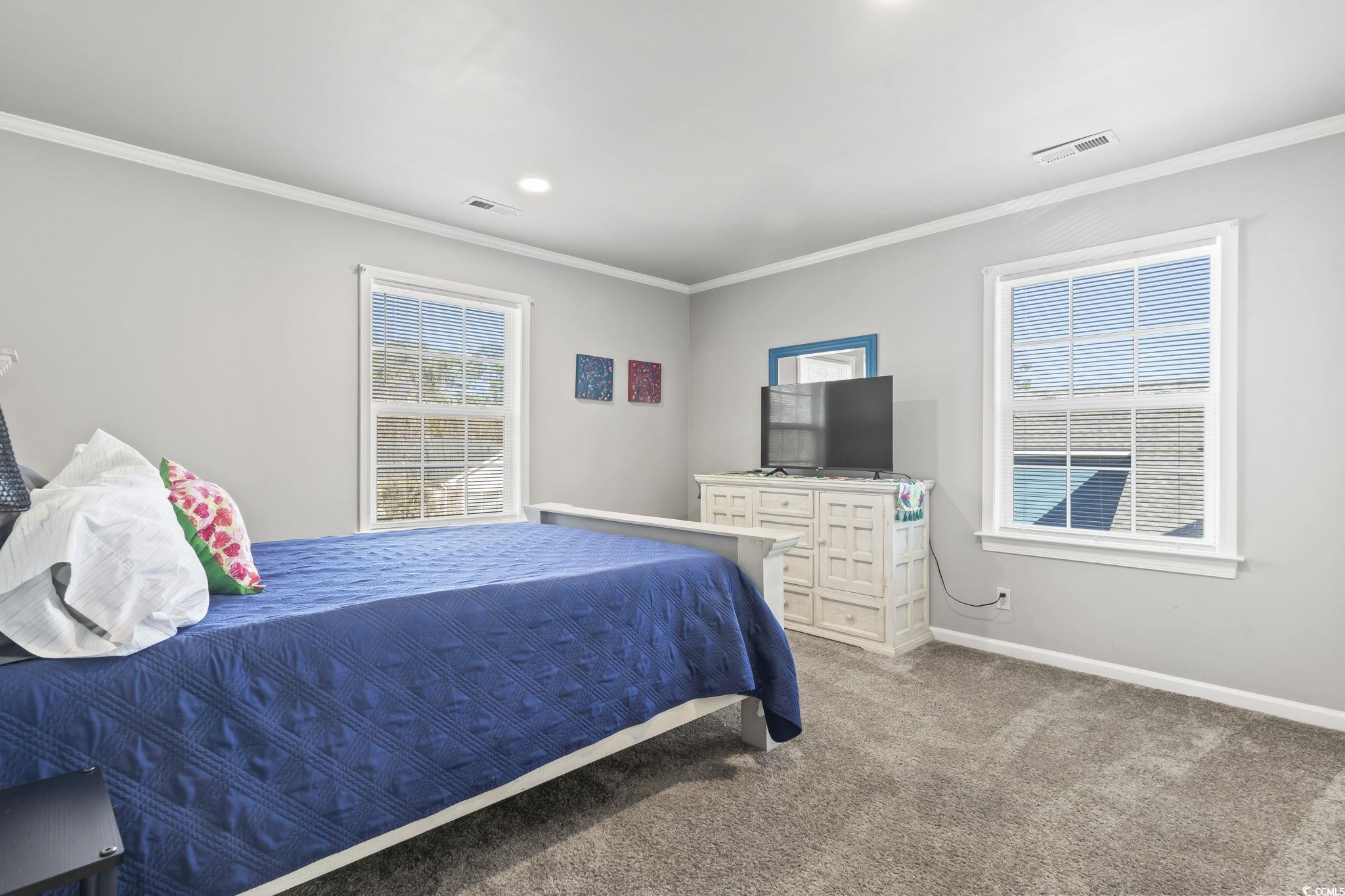 409 Knoll Court Myrtle Beach, SC 29588 - Photo 26 of 33 Carpeted bedroom featuring ornamental molding and recessed lighting
