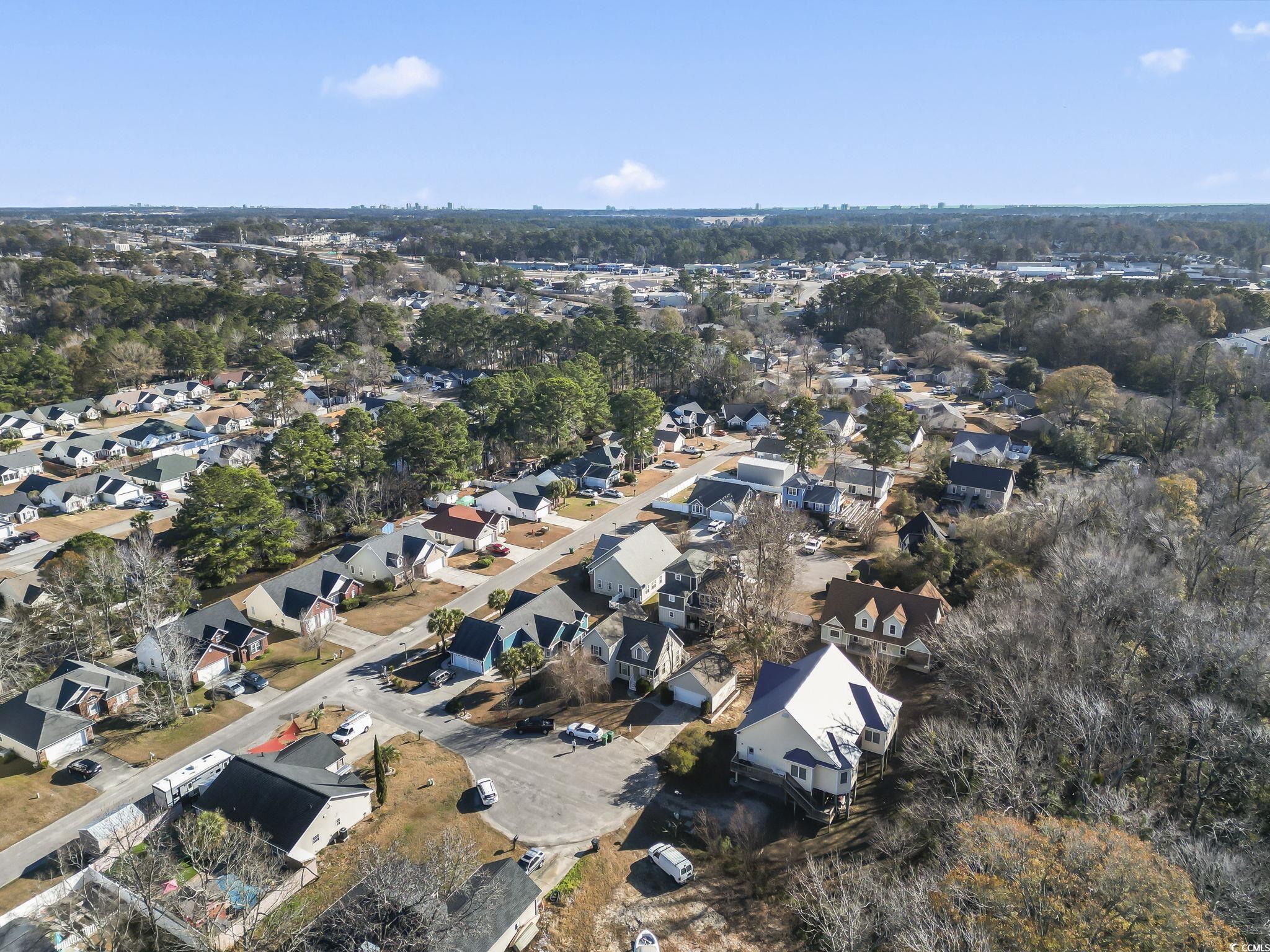 409 Knoll Court Myrtle Beach, SC 29588 - Photo 31 of 33 View of property location featuring nearby suburban area and a tree filled landscape