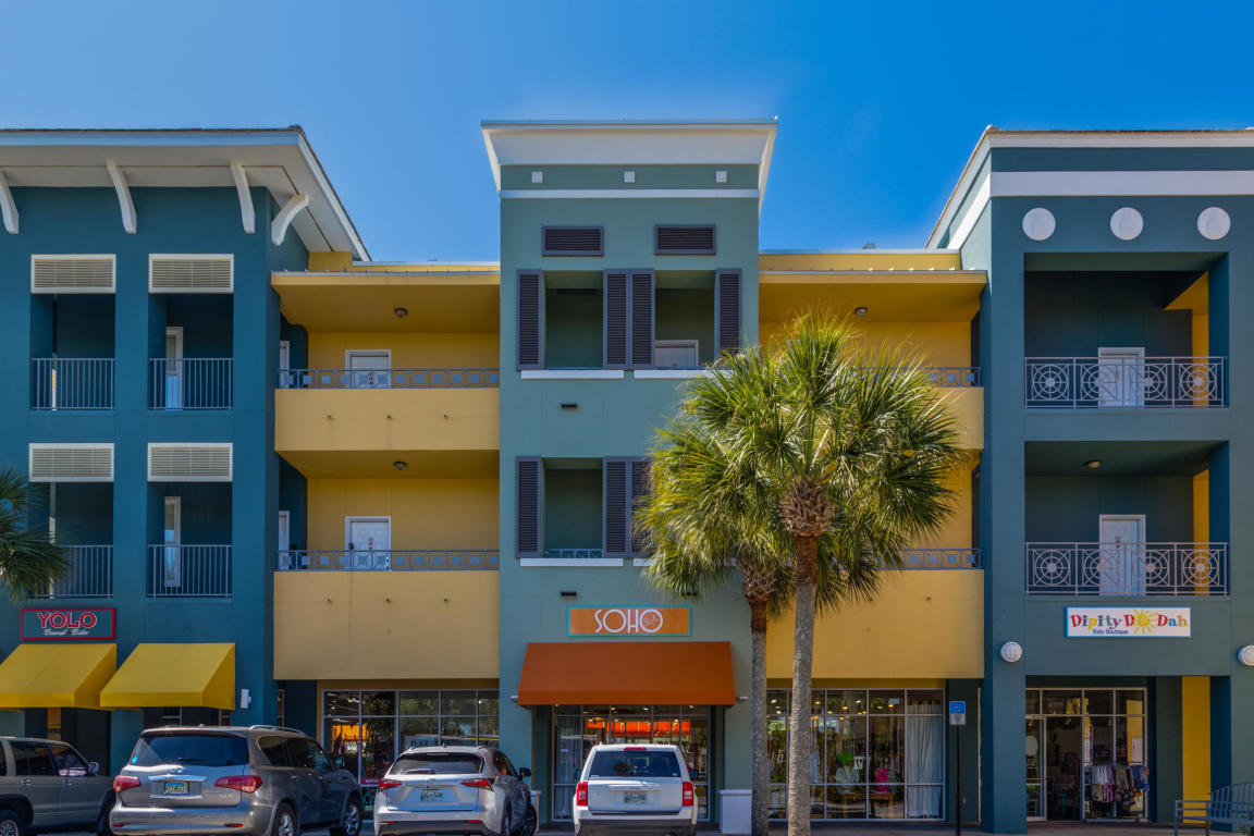 1740 South County Highway, Unit 110 Santa Rosa Beach, FL 32459 - Photo 18 of 22 a front view of a building with garden