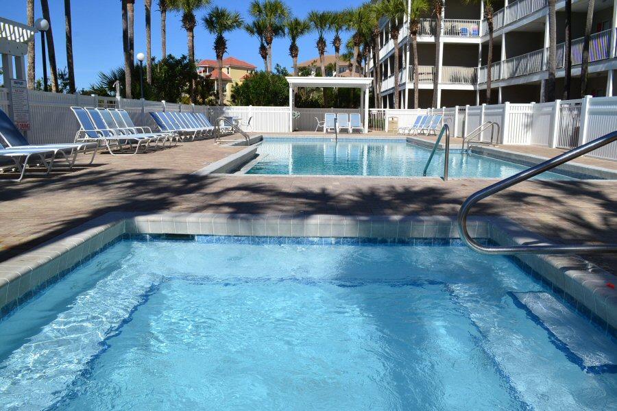 1740 South County Highway, Unit 110 Santa Rosa Beach, FL 32459 - Photo 8 of 22 a view of a swimming pool with a yard